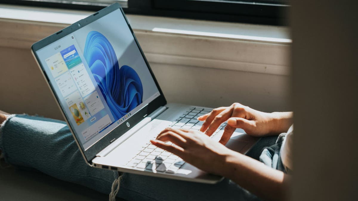 man using laptop